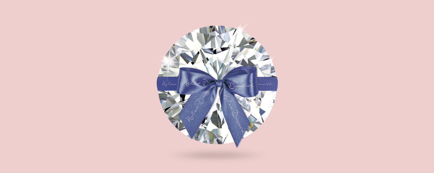 Image of Diamond with bow around centre